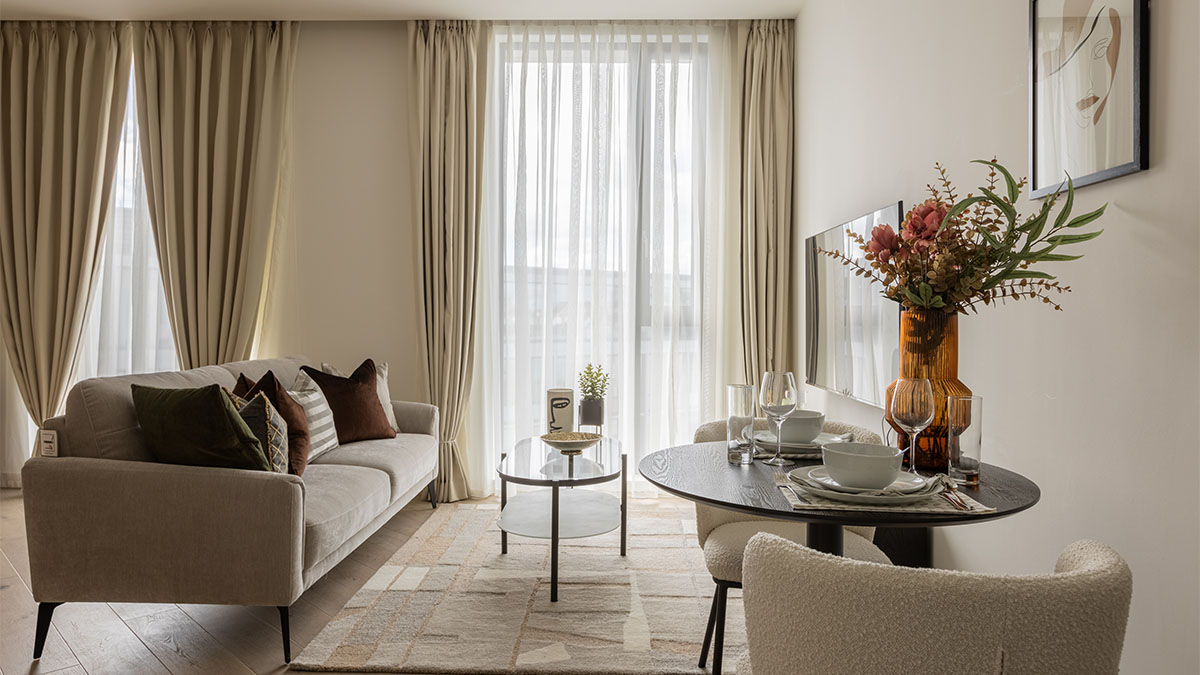 Living area with sofa and table Pembridge Gardens