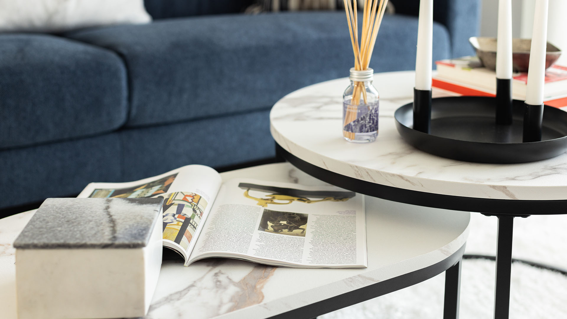 Marble coffee table with Blue Sofa of Green Park Village