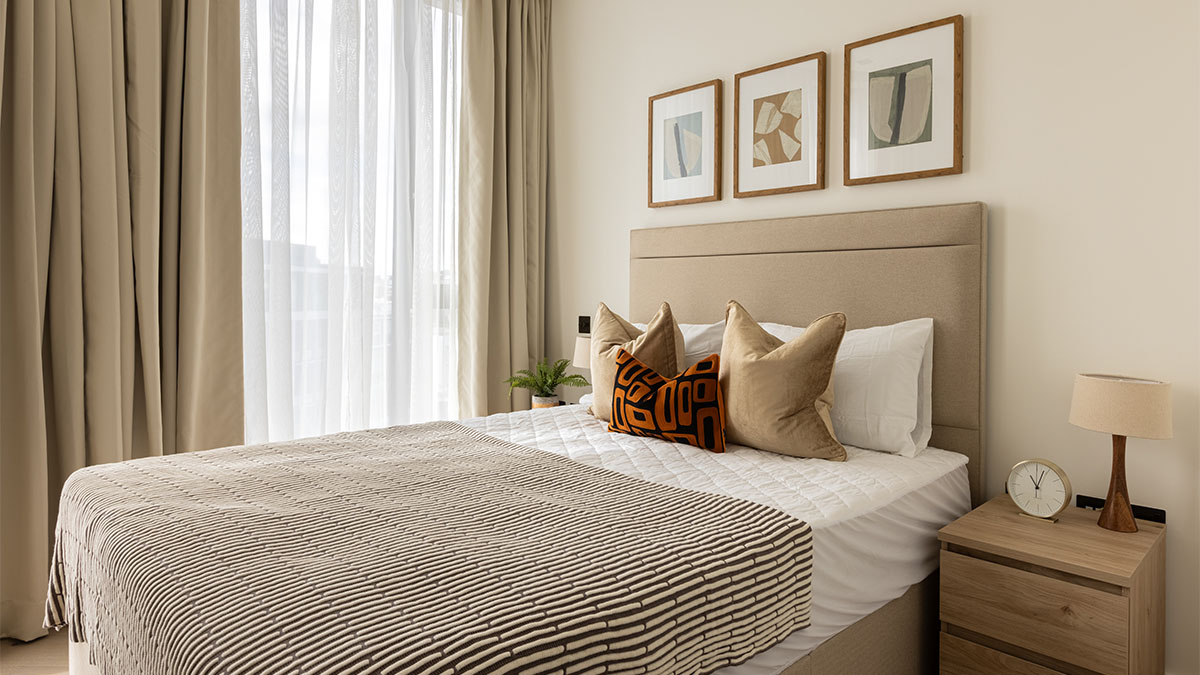 bedroom with side table and window dressing of Pembridge Gardens