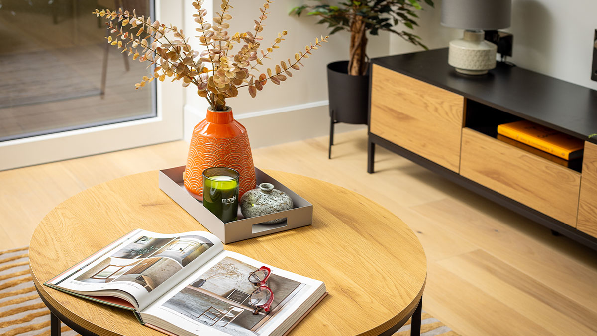 book and flower on table of Cassini White City