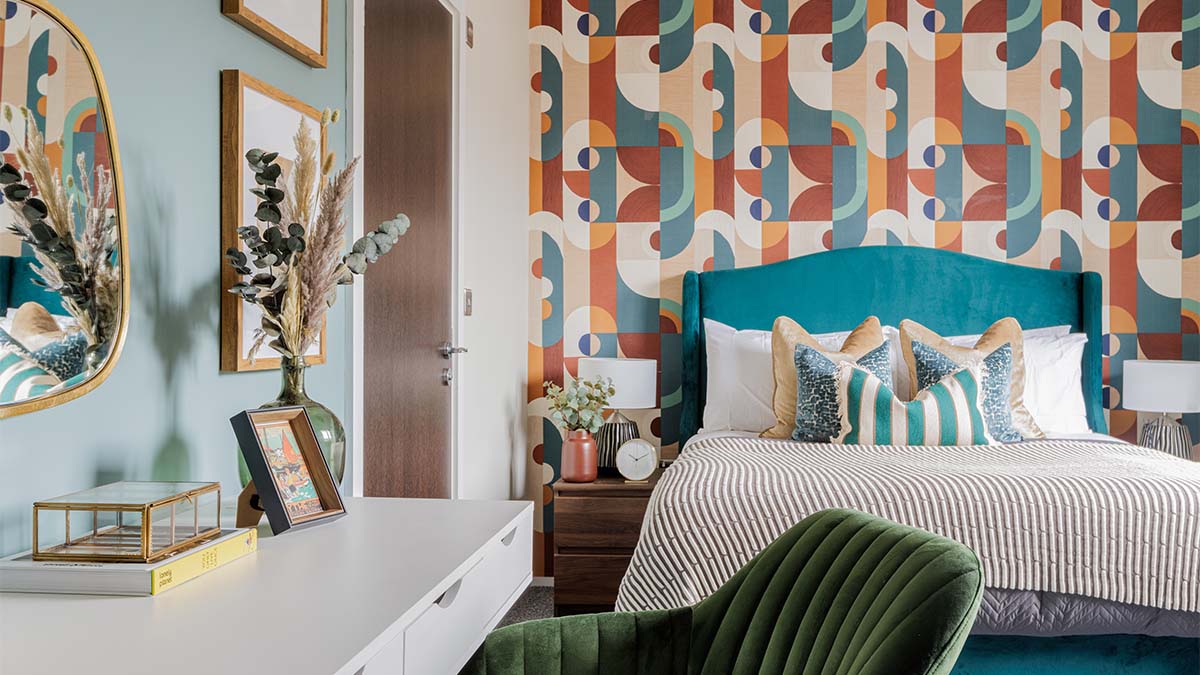 designed bedroom with a vibrant geometric accent wall of Bowen House