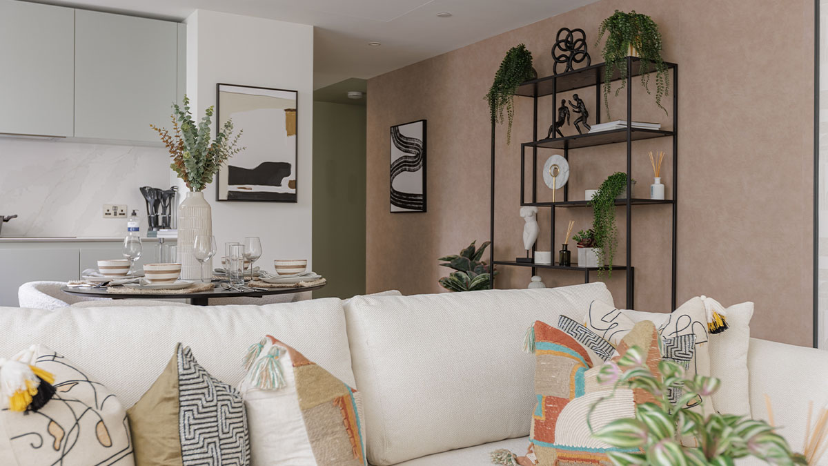 open-plan living and dining area and patterned cushions of Harcourt Gardens