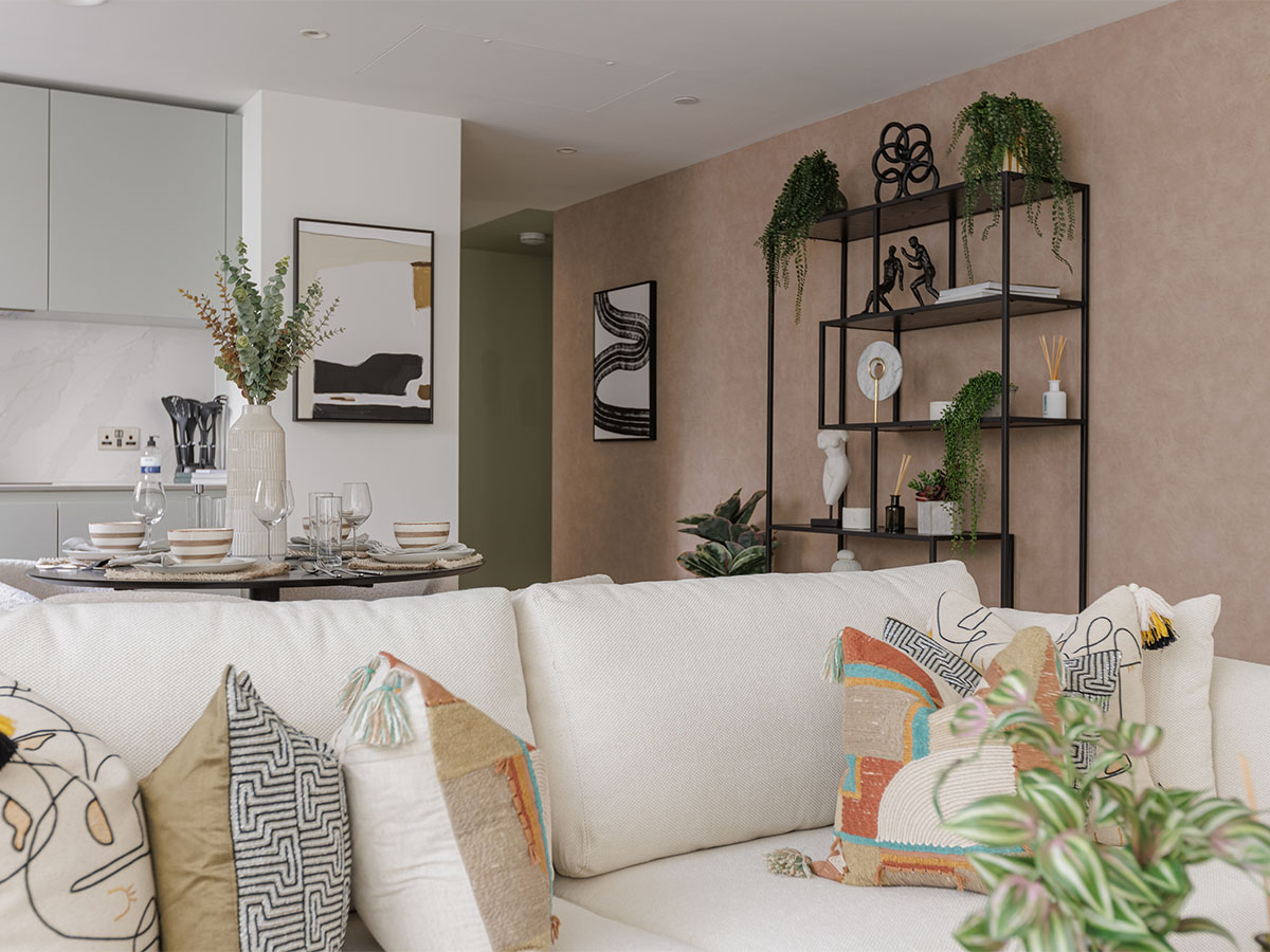 White sofa and modern shelf with art pieces of Harcourt Gardens