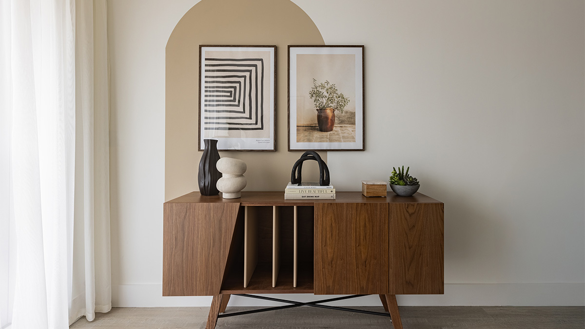 living room with wooden console table, artwork, and decor