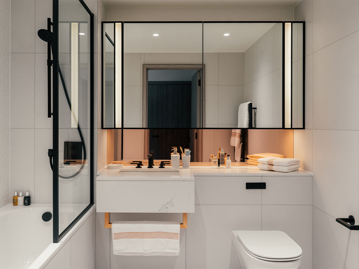 Modern bathroom with black and white accents of Aspen Studio