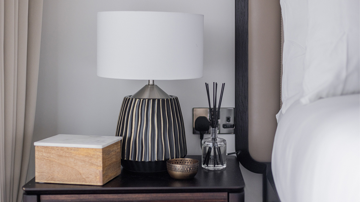 Modern bedside table with lamp and decor of Cassini