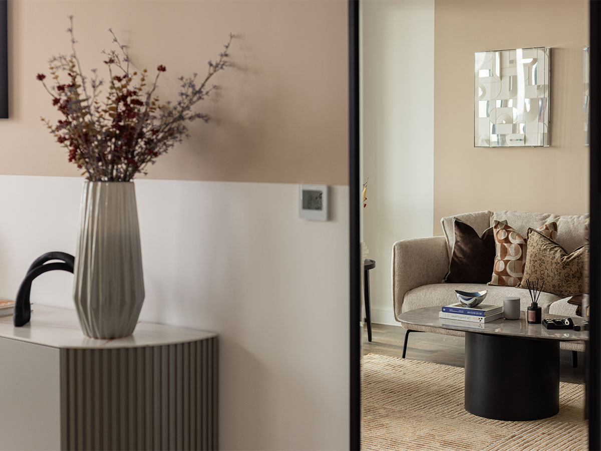 Modern living room with beige walls and sofa of Coronation Square