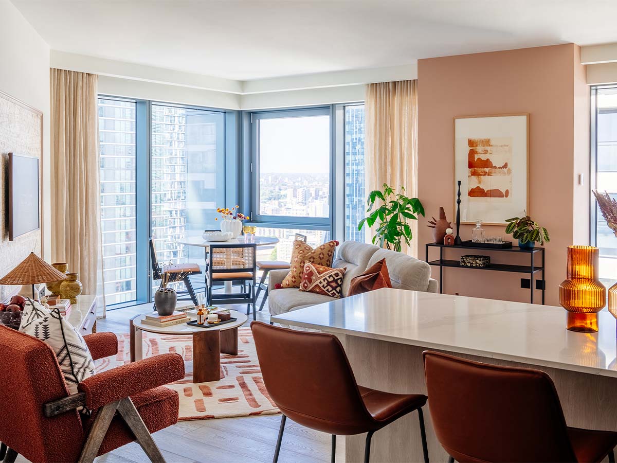 Modern living room with orange accent chairs of Aspen