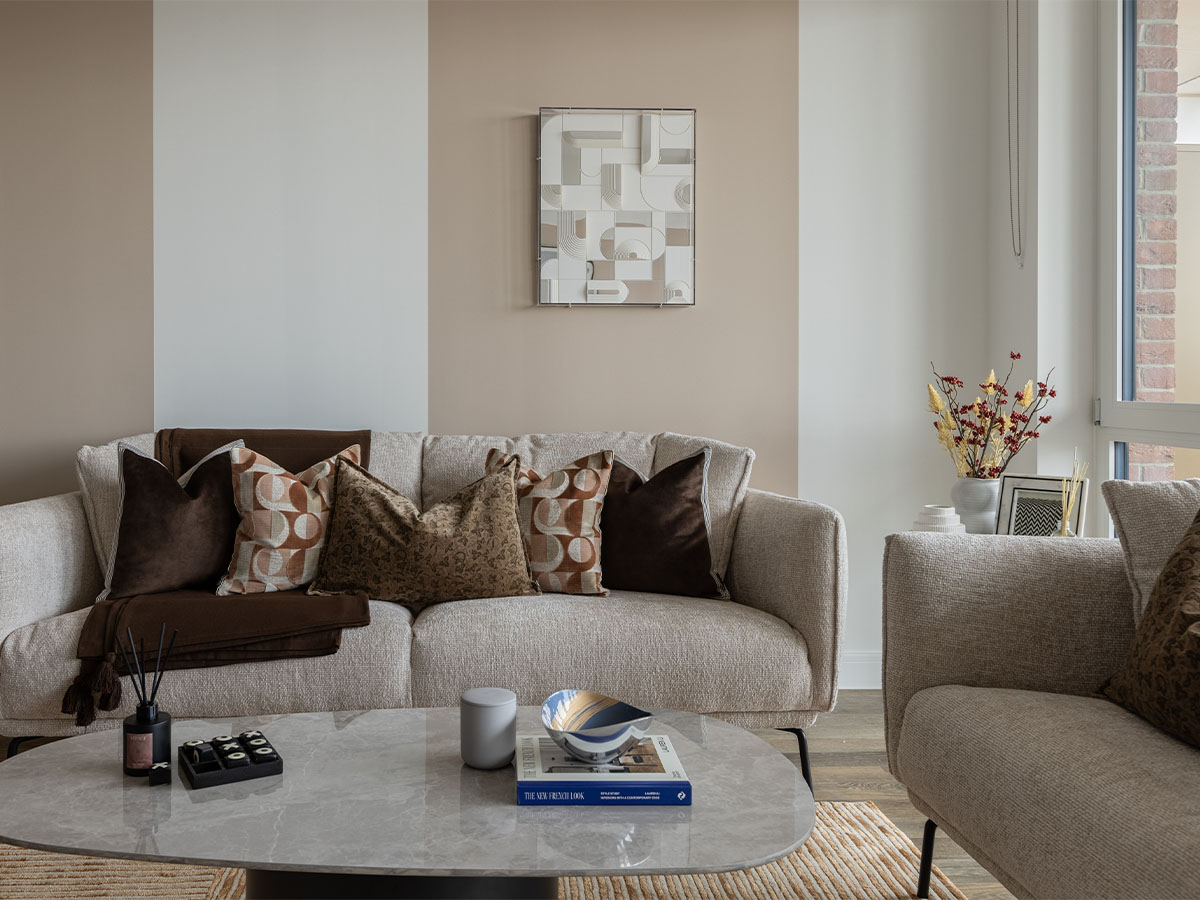 Modern living room with sofa and coffee table of Coronation Square