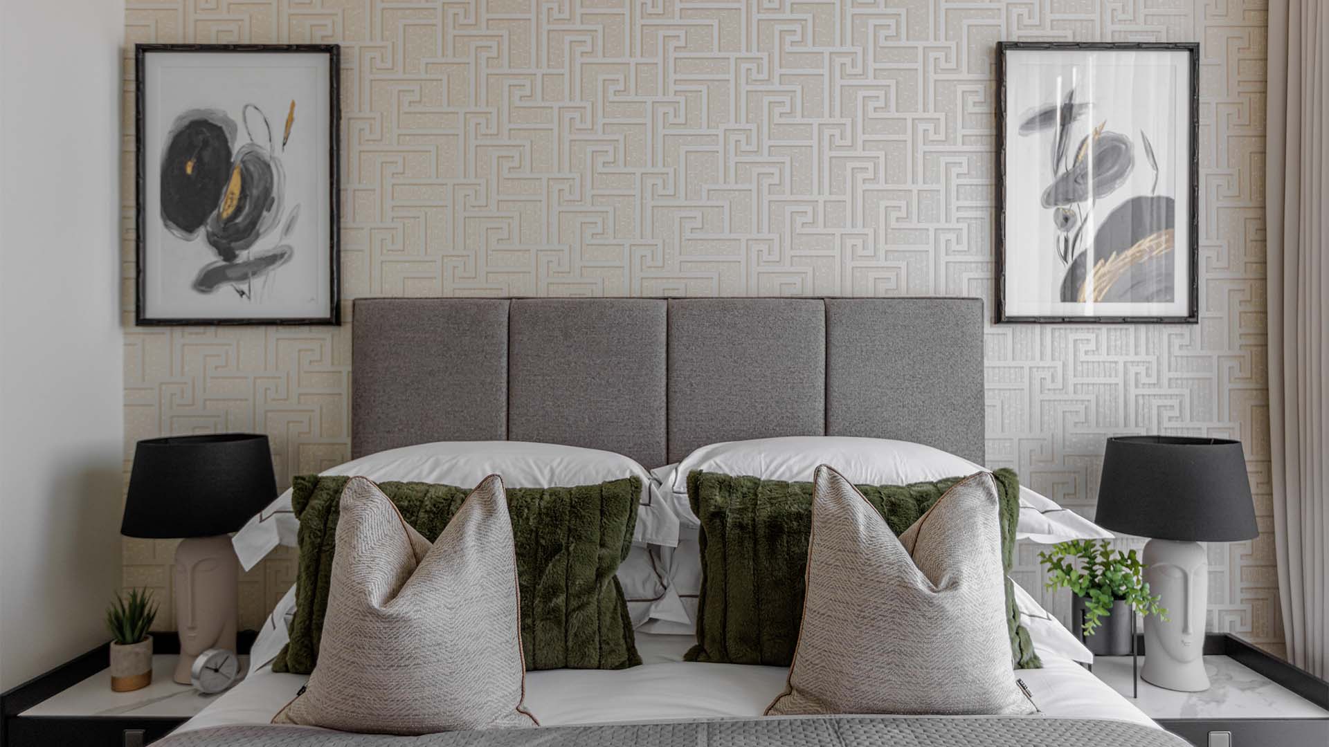 Modern bedroom with textured wallpaper and art